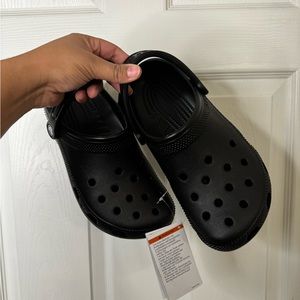 Black Crocs- New (Mens 7/ Women’s 9)